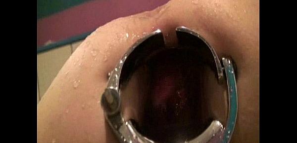  Tight asshole stretched by speculum for a water enema